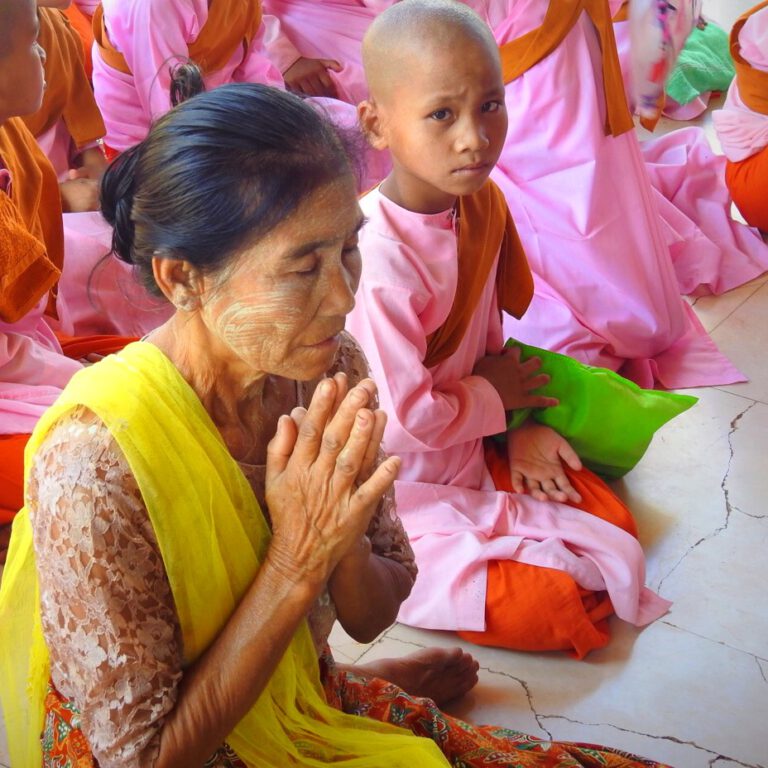 Myanmar - old praying lady