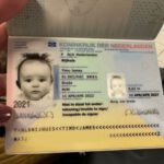 Paspoort baby met eerste stempel